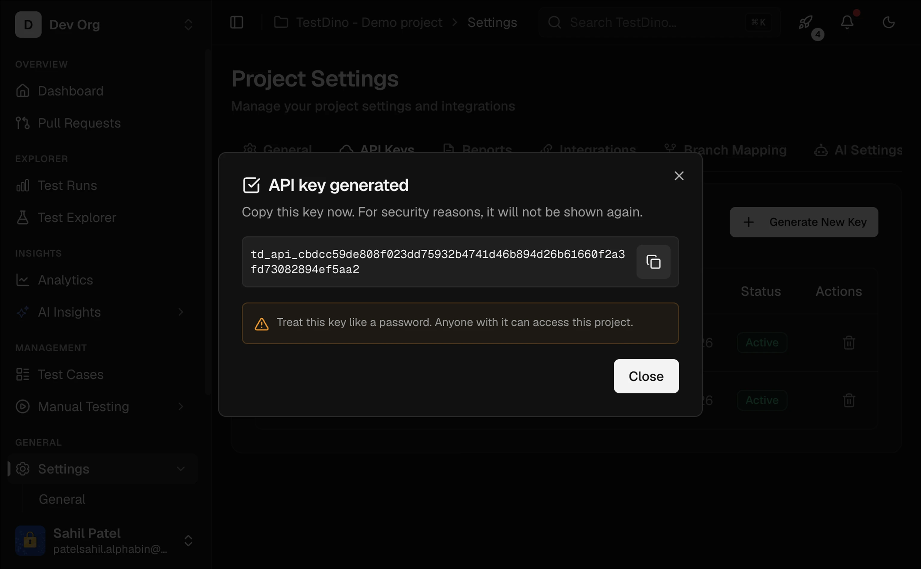 TestDino Project Settings API Keys page showing generated key with copy button