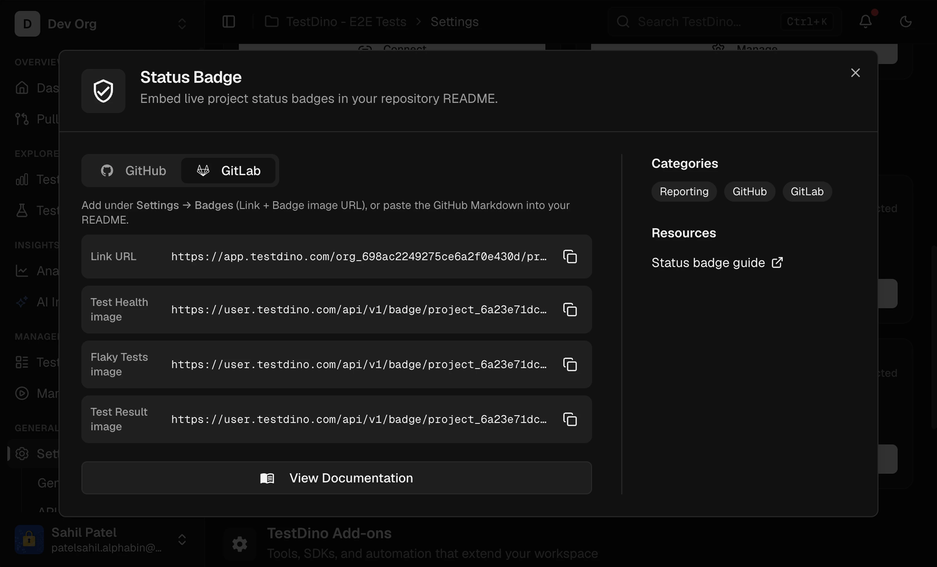Status Badge dialog on the GitLab tab showing Test Health, Flaky Tests, Test Result, and All badges with copyable snippets